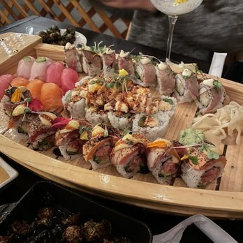 Yamashiro Hollywood signature dishes Miso-marinated Cod, Yellowtail Serrano Sashimi, Sushi, Jumbo Shrimp Tempura 